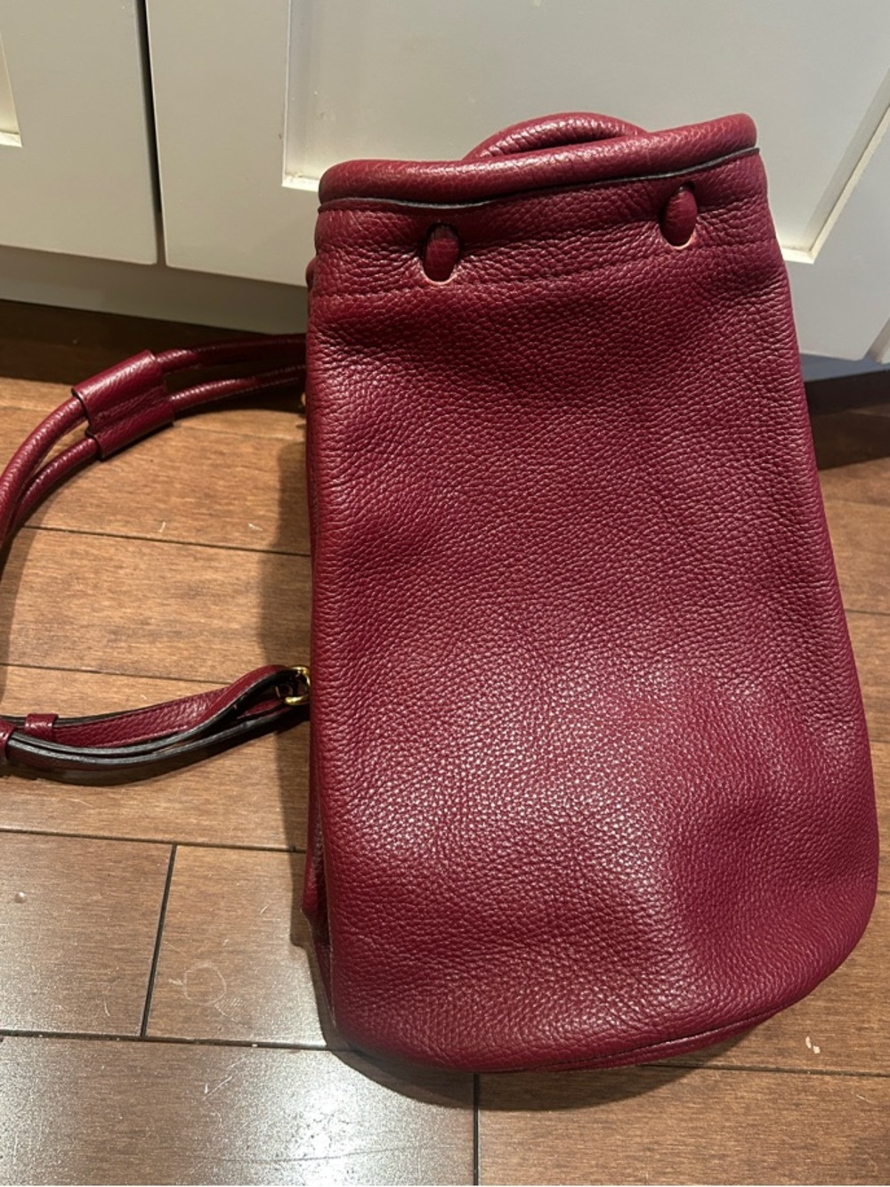 Vintage Delvaux leather sling bag/backpack in Burgundy
